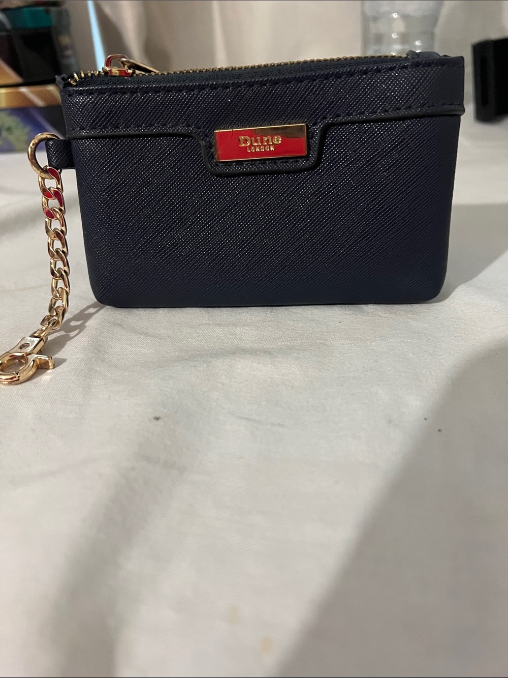Dune London Navy Saffiano Zip Wristlet with Gold Chain
